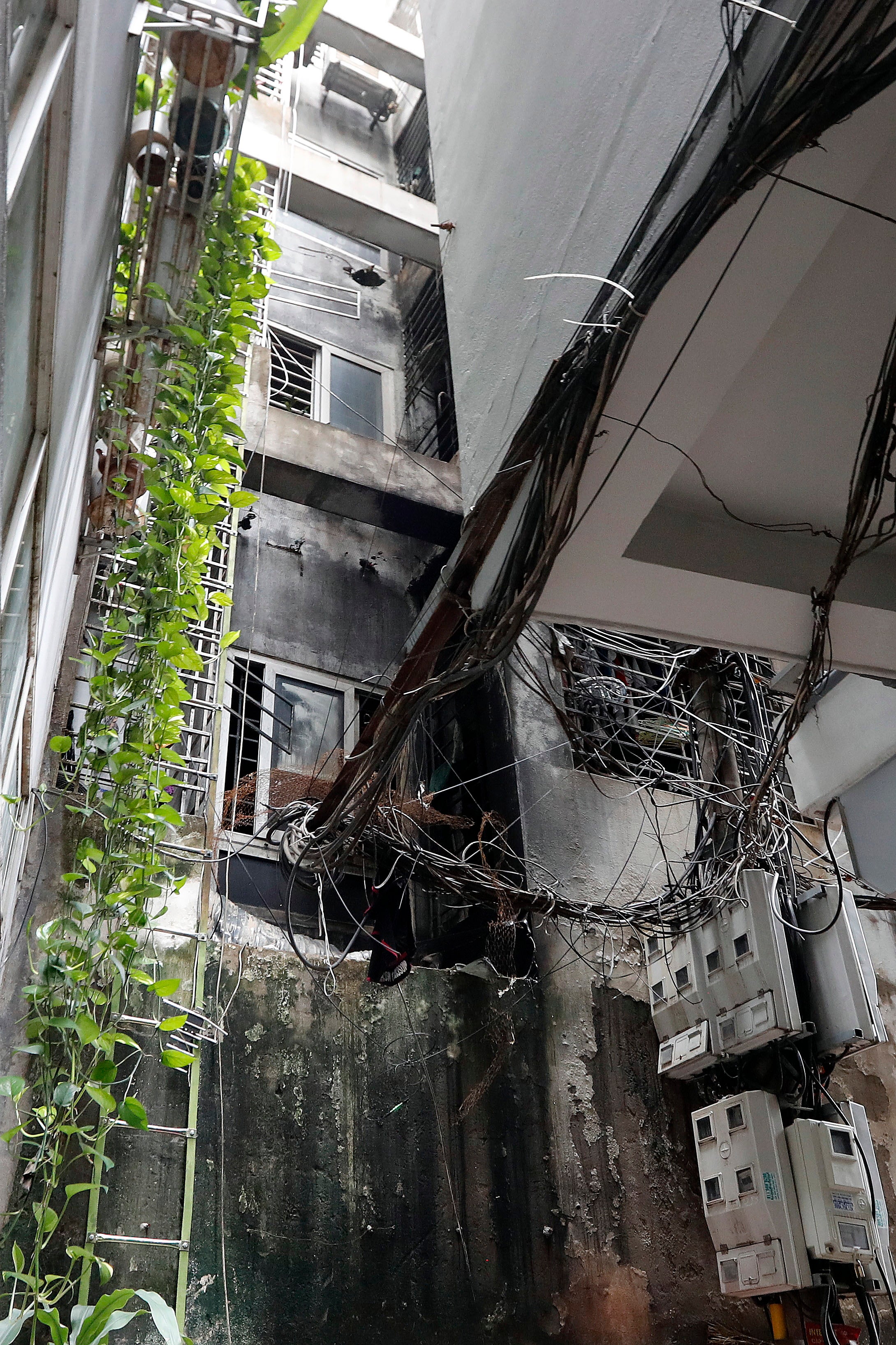 The back of an apartment block after a fire erupted in Hanoi, Vietnam