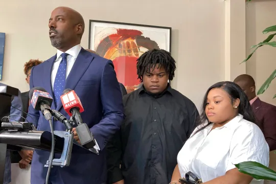 <p>Attorney Cory Lynch speaks at a press conference with Treveon Taylor and Jessica Ross </p>