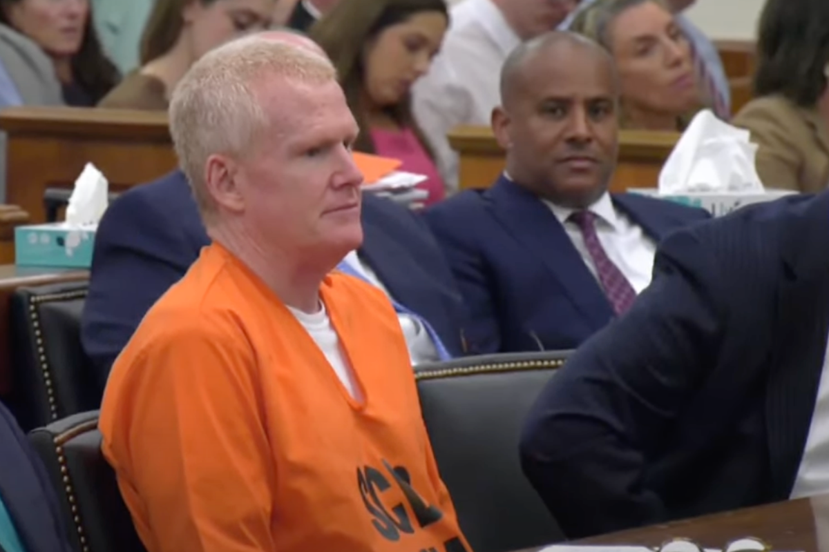 South Carolina lawmaker Todd Rutherford stands to shake hands with ...