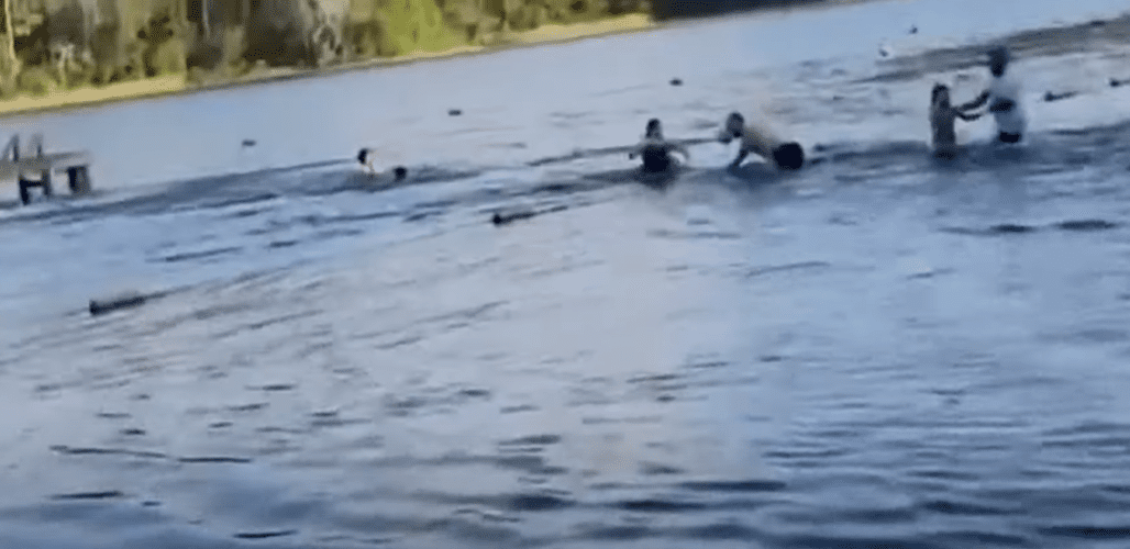 Horrific moment captured on camera as girls scramble for their lives out of the lake