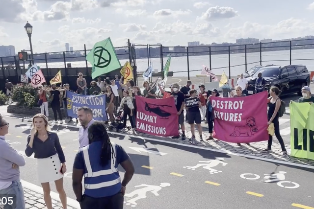 <p>Extinction Rebellion protesters blockaded the entrance to the West 30th St heliport in New York City on Wednesday </p>