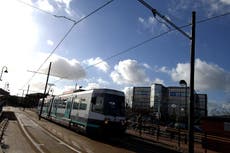 Four face charges over restraint death on Manchester tram system