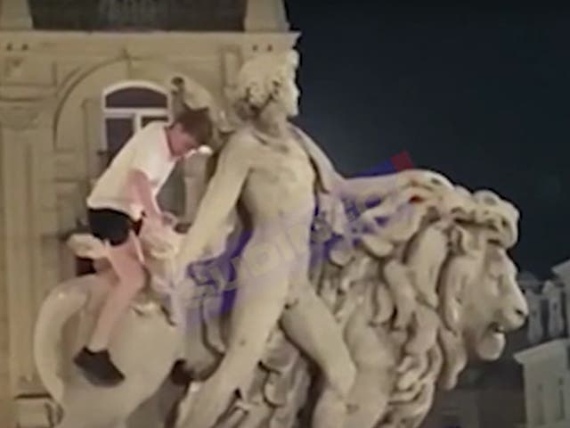 <p>The man accidentally broke a piece off the statue while climbing on it</p>