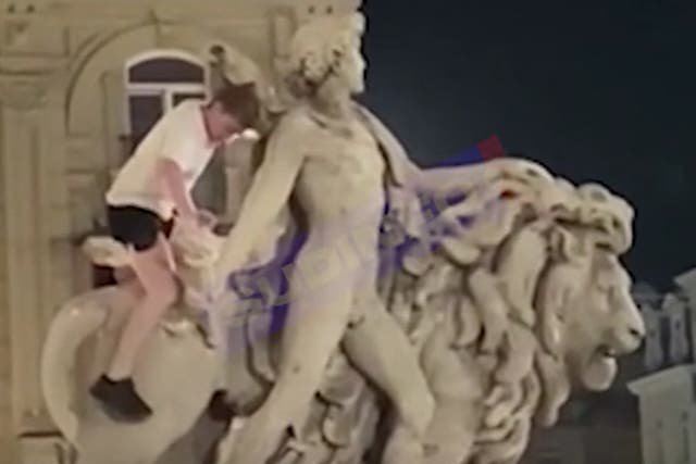 <p>The man accidentally broke a piece off the statue while climbing on it</p>