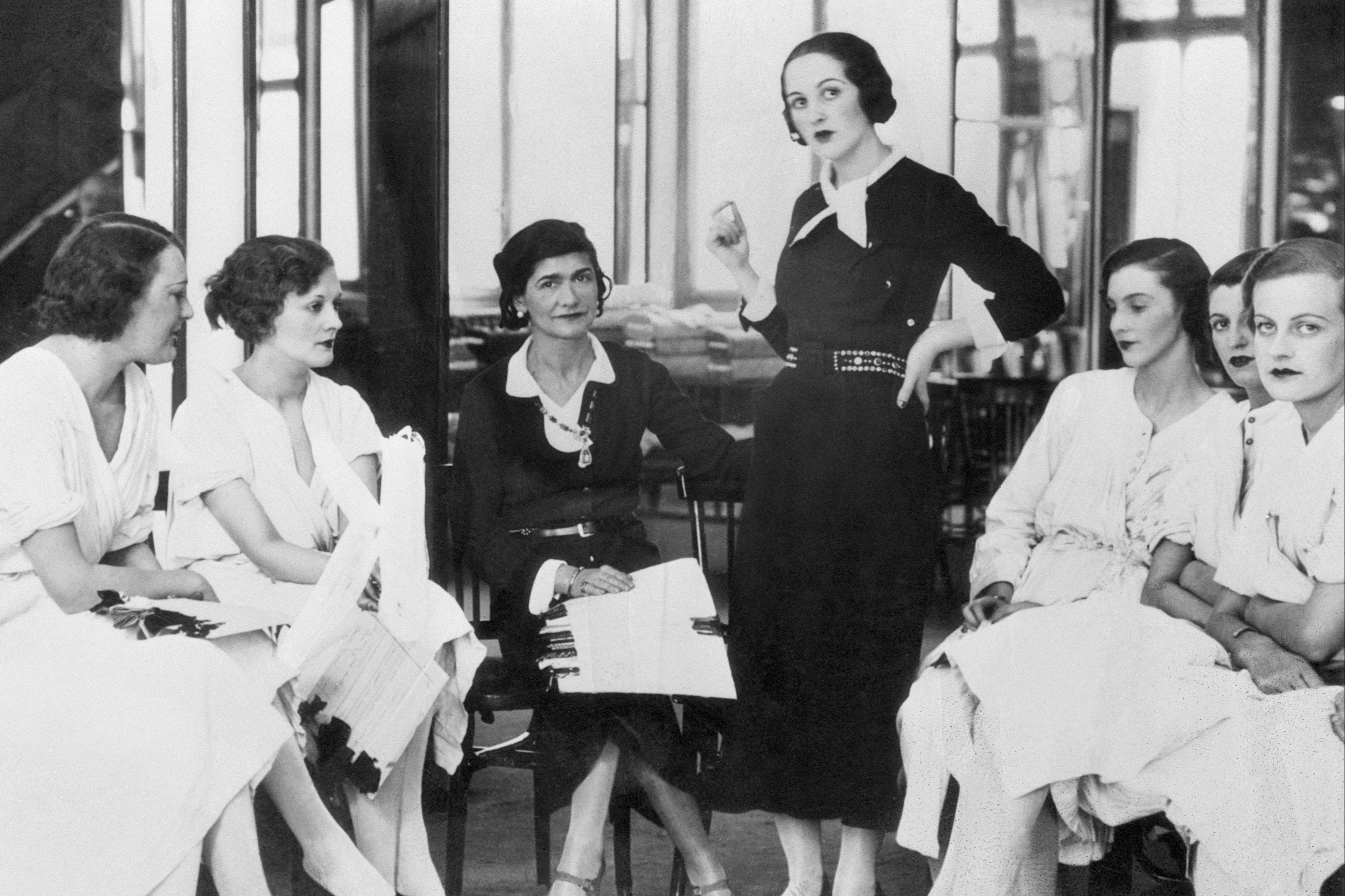 Chanel (centre) is surrounded by London socialite Lady Pamela Smith and an array of French models in 1932