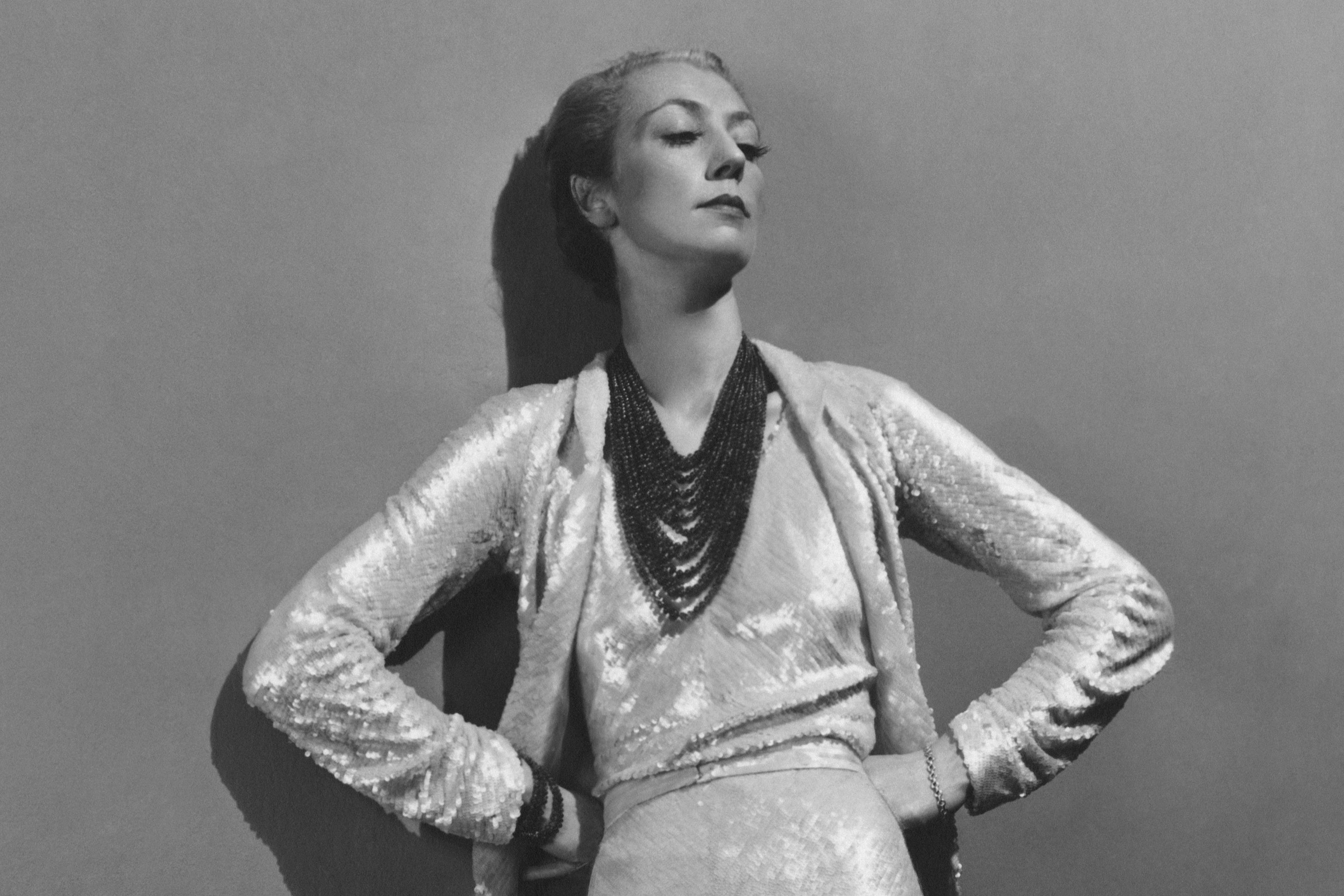 Jose-Maria Sert wearing a white sequin dress by Chanel, as photographed for ‘Vogue’ in 1936