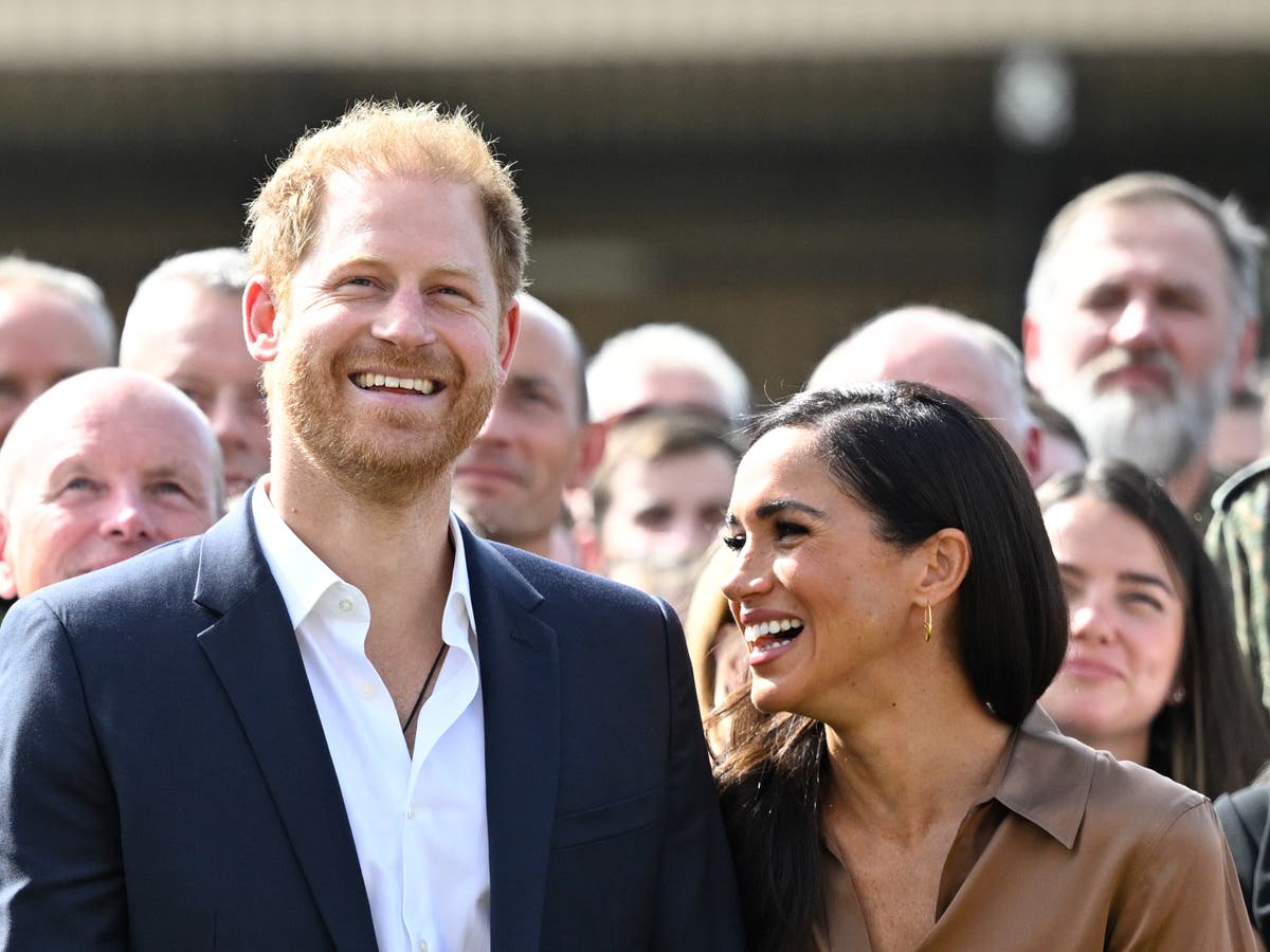 Harry and Meghan delight fans after loved up appearance at Invictus ...