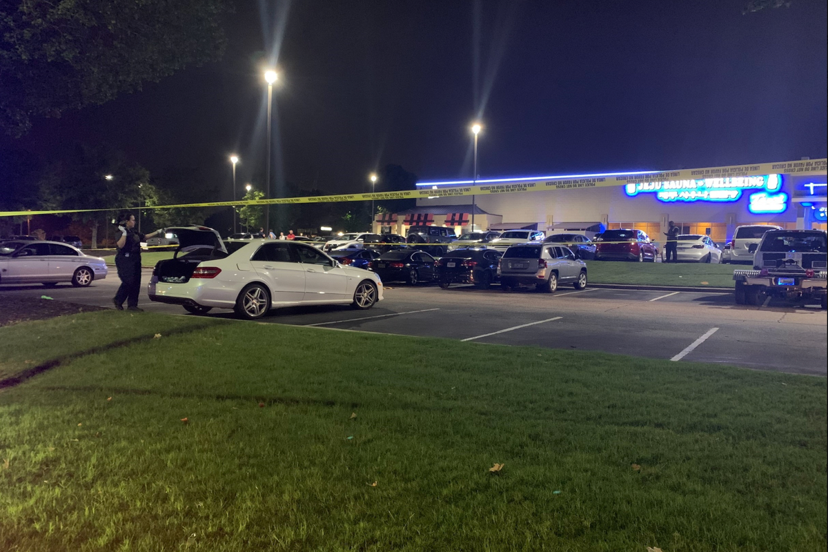 Five people arrested on murder charges after body found in trunk of car ...