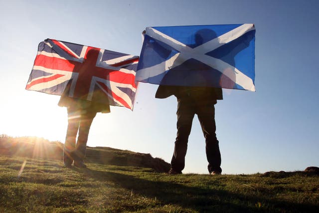 SNP members are to debate a motion calling on the Scottish Govenrment to start independence negotiations with the UK if the party wins a majority of Scottish seats in the next Westminster election (David Cheskin/PA)