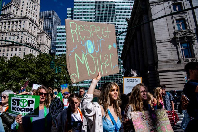 <p>Activists walk through lower Manhattan for the Global Climate Strike protests. 2023 has already experienced the hottest summer so far </p>