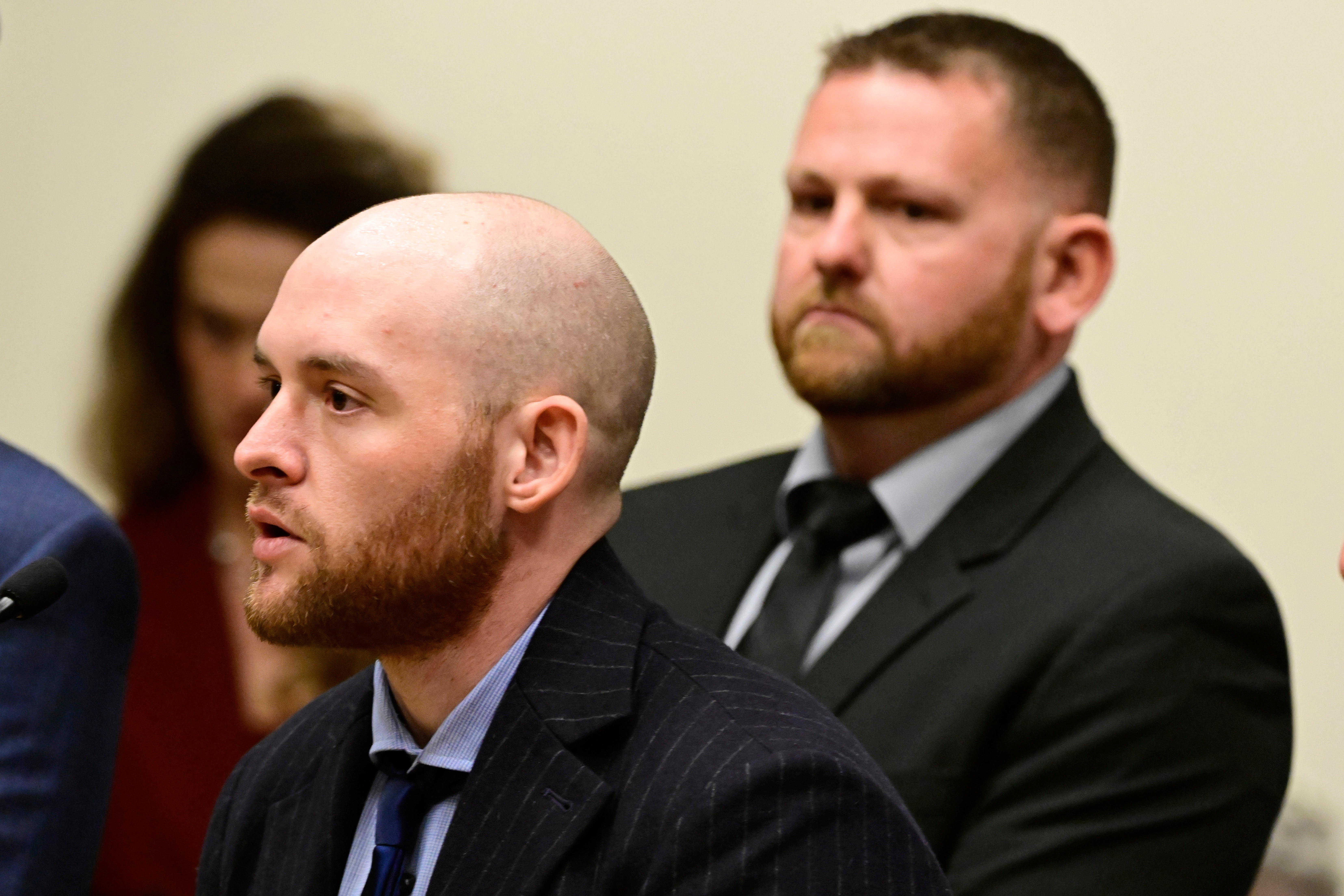Former officer Jason Rosenblatt, left, and Aurora Police Officer Randy Roedema, right, at an arraignment at the Adams County Justice Center in Brighton, Colorado in January 2023