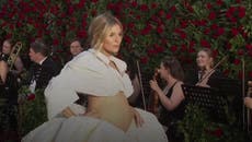 Sienna Miller bares baby bump at celebrity and royal-studded Vogue World
