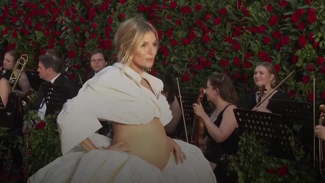 <p>Sienna Miller bares baby bump at celebrity and royal-studded Vogue World.</p>