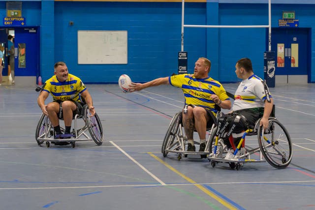 Former Warrington stars Paul Cullen (left) and Ben Westwood (centre) recently tried out wheelchair rugby league (Phillip Tugwell/Warrington Wolves Foundation)