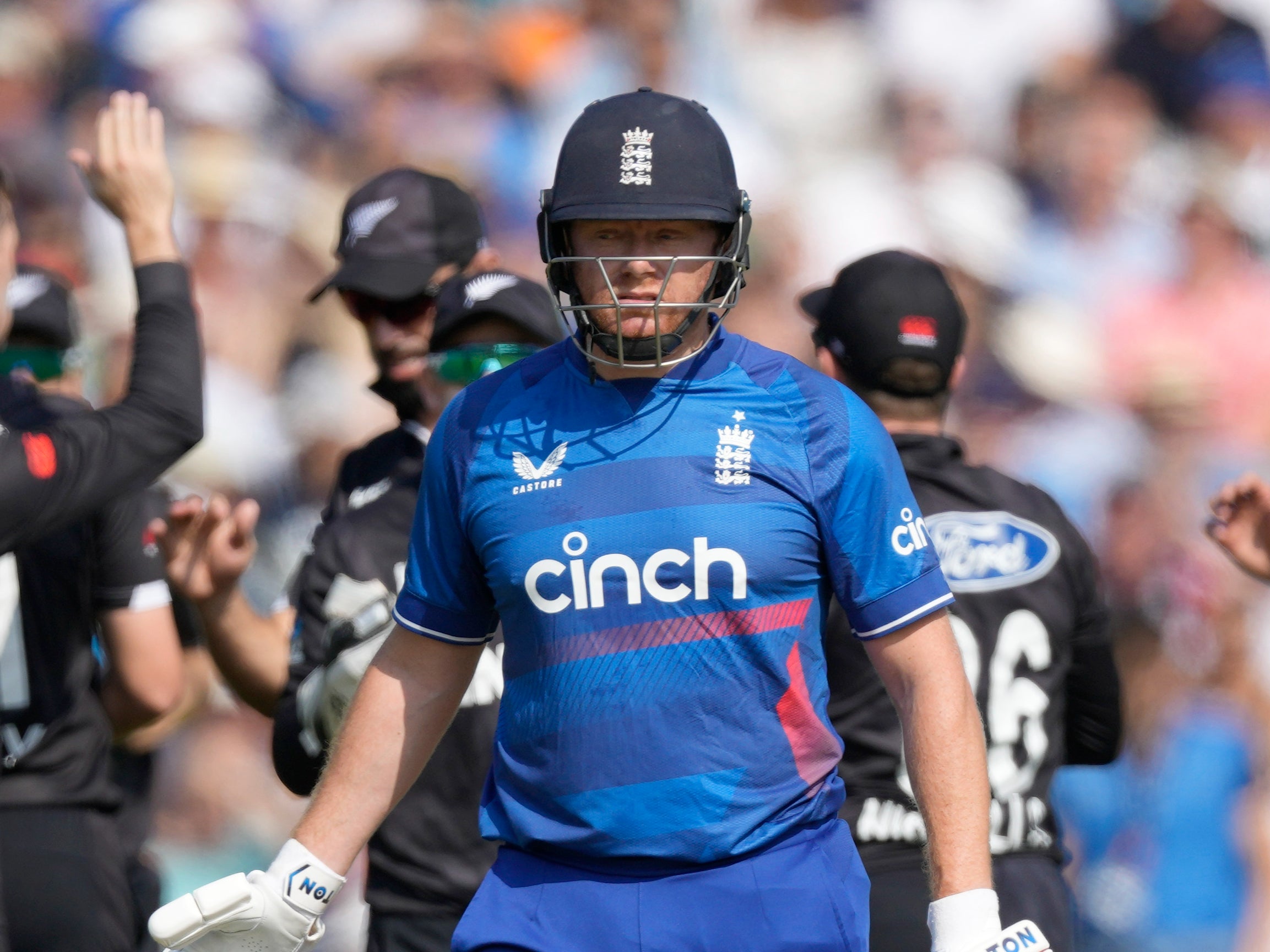 <p>England's Jonny Bairstow leaves the pitch after he is dismissed by New Zealand's Matt Henry</p>