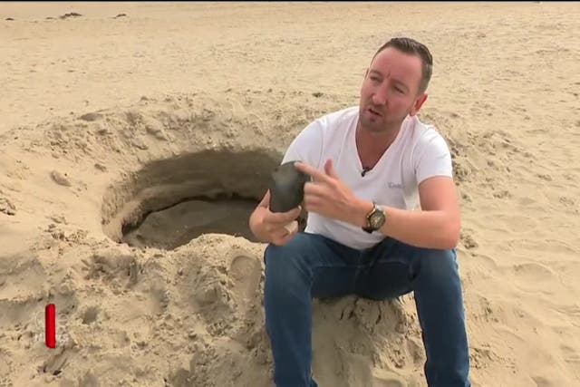 <p>‘Mysterious crater’ found on beach from ‘cosmic event’ turns out to be a hole dug by friends having fun</p>