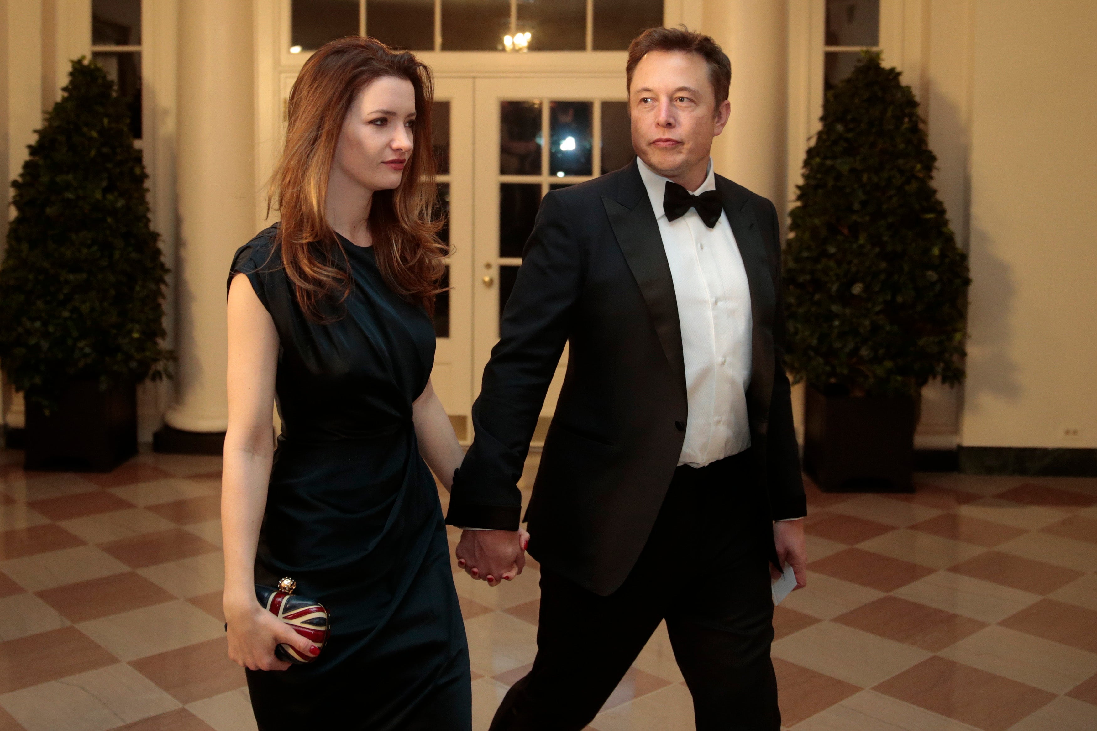 Musk and his then wife Talulah arrive for a state dinner hosted by Barack Obama in honour of French president Francois Hollande at the White House in 2014