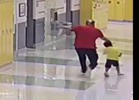 Footage shows the pre-school employee strike the boy from behind, causing him to fall heavily to the hallway floor