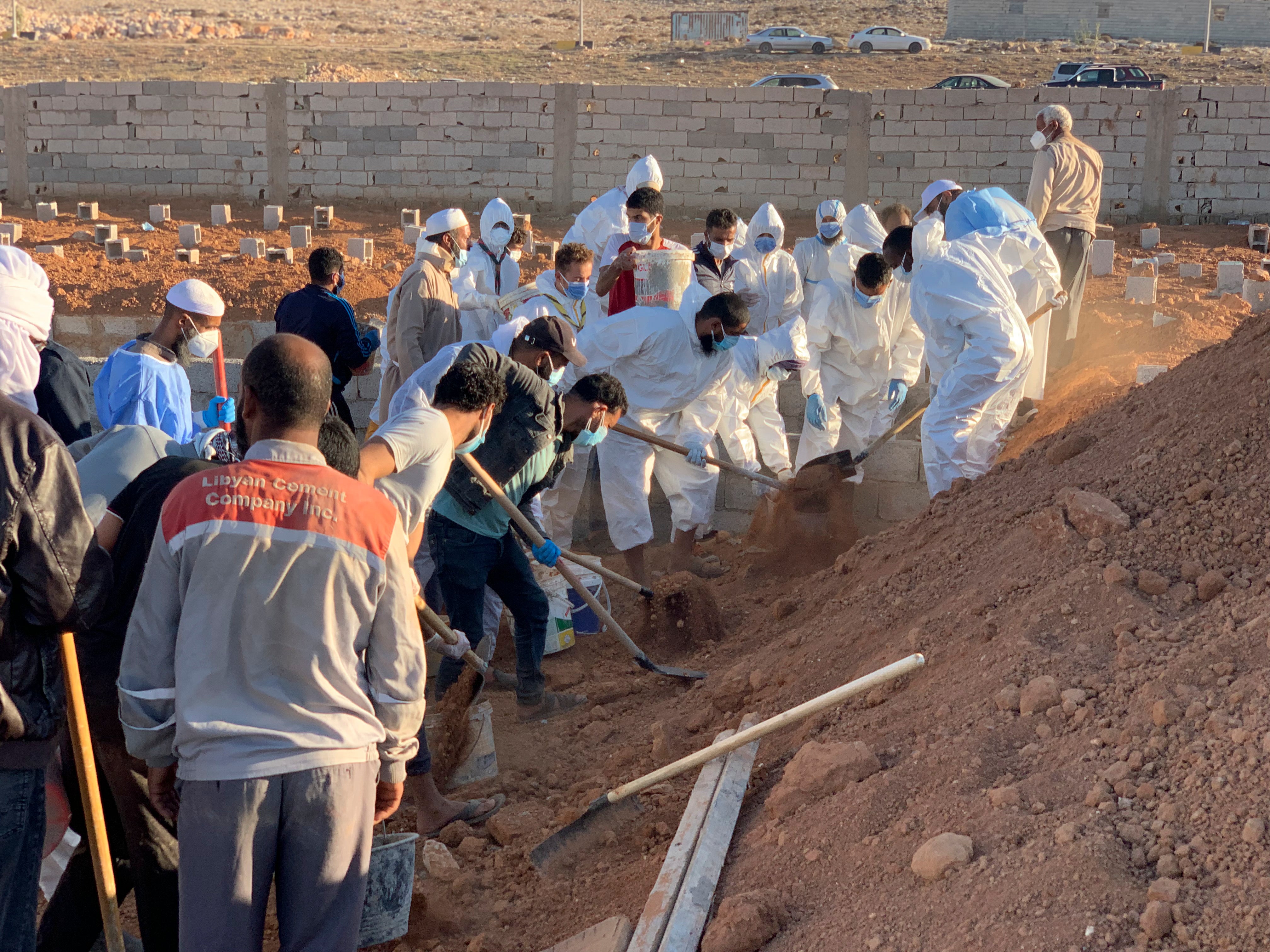 Victims of the flash flood are buried in Derna on Friday
