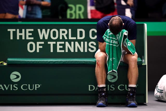 Andy Murray cries into his towel after beating Leandro Riedi (Martin Rickett/PA)