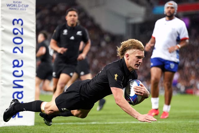 Damian McKenzie scored two tries as New Zealand romped past Namibia in Pool A (Adam Davy/PA)