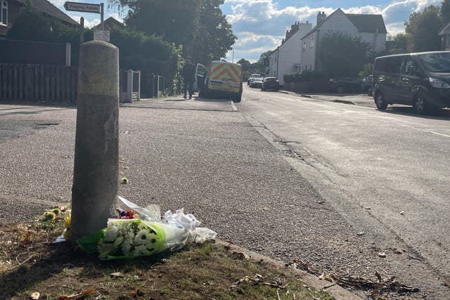 Floral tributes outside a property in Main Street, Stonnall, Staffordshire (Matthew Cooper/PA)