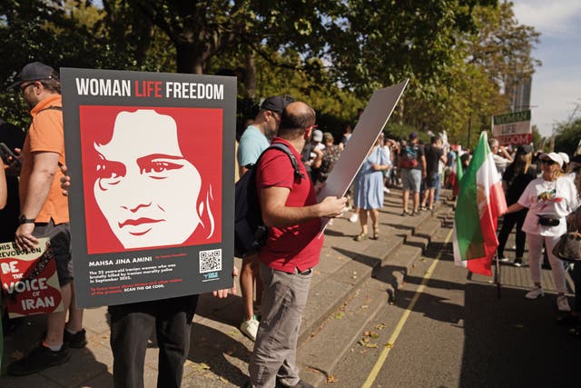 People take part central in London, to mark the one year anniversary of Mahsa Amini’s death (James MAnning/PA)