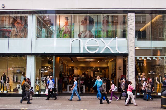 Fashion chain Next will give a glimpse into how the UK high street has fared this summer after a sunny June boosted sales earlier in the season (Alamy/PA)