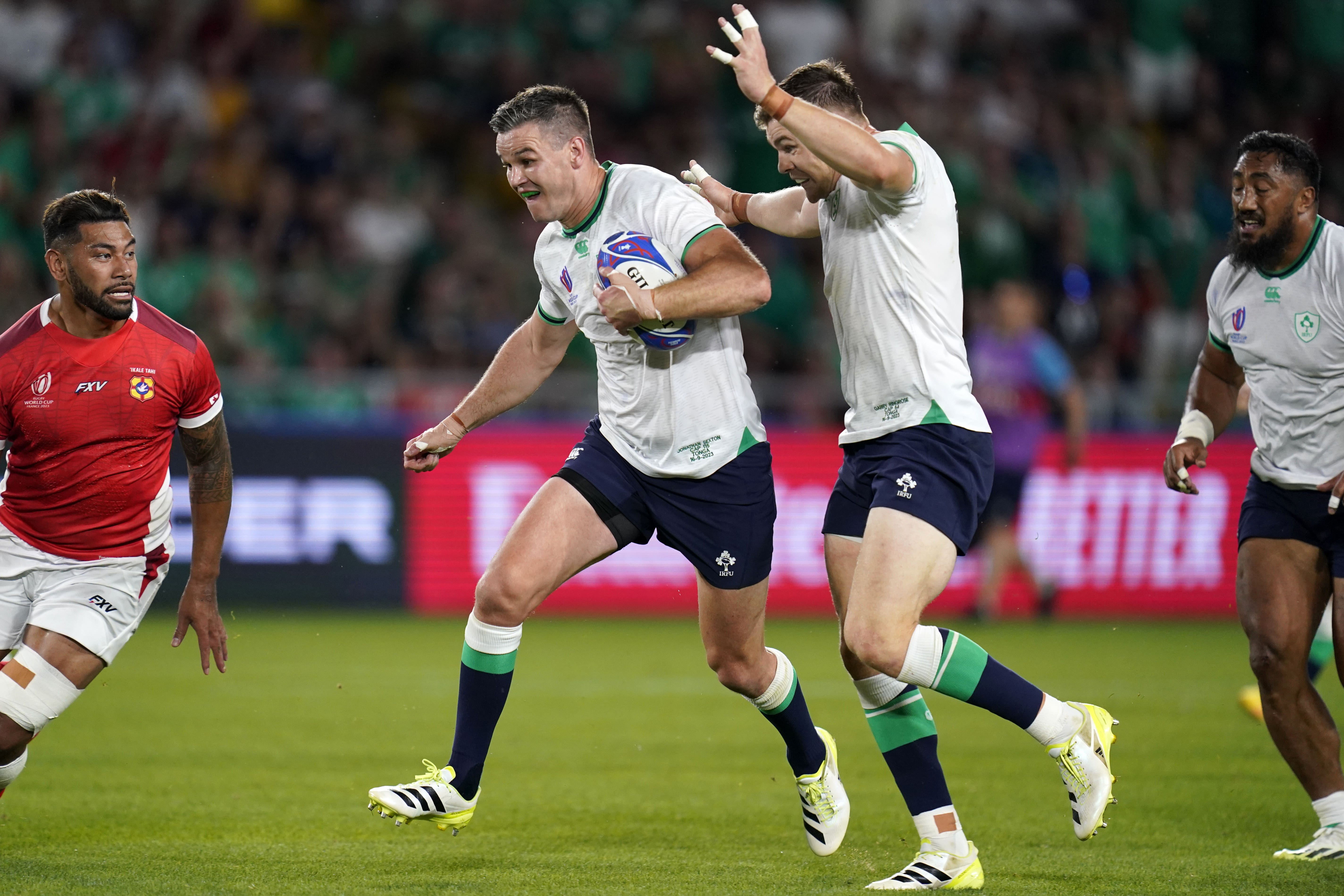 Johnny Sexton, with ball, already has three tries at the World Cup (Andrew Matthews/PA)