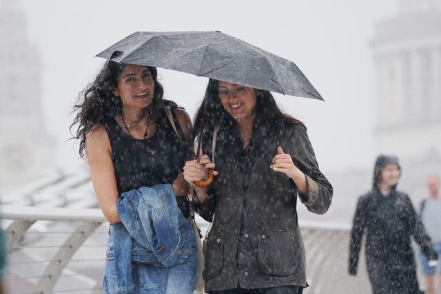 Half a month’s rain could fall in an hour in some parts of the UK as thunderstorms move across southern England, the Met Office has said (PA)