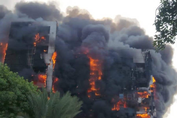 A fire raging fire at the Greater Nile Petroleum Oil Company Tower in Khartoum