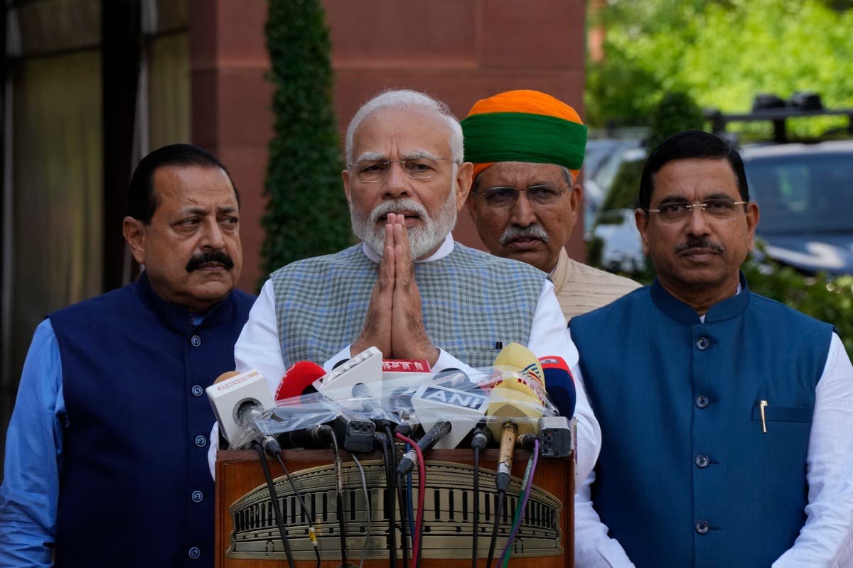 Indian lawmakers attend the last session before moving to a new ...