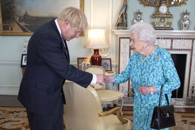 <p>Queen Elizabeth II welcoming the newly-elected leader of the Conservative party Boris Johnson during an audience in Buckingham Palace</p>