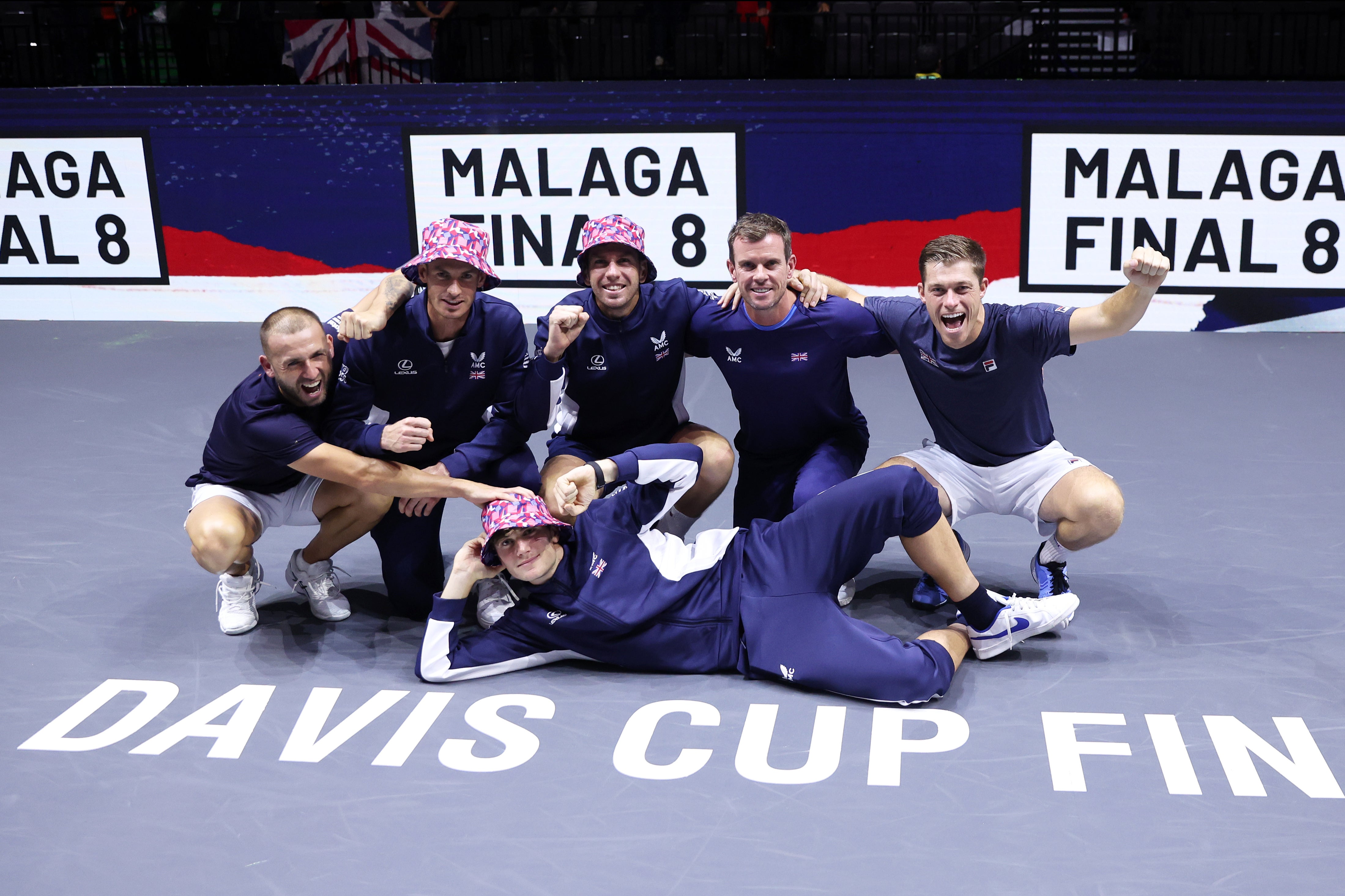 Andy Murray and Jack Draper celebrate with team-mates after Great Britain’s victory
