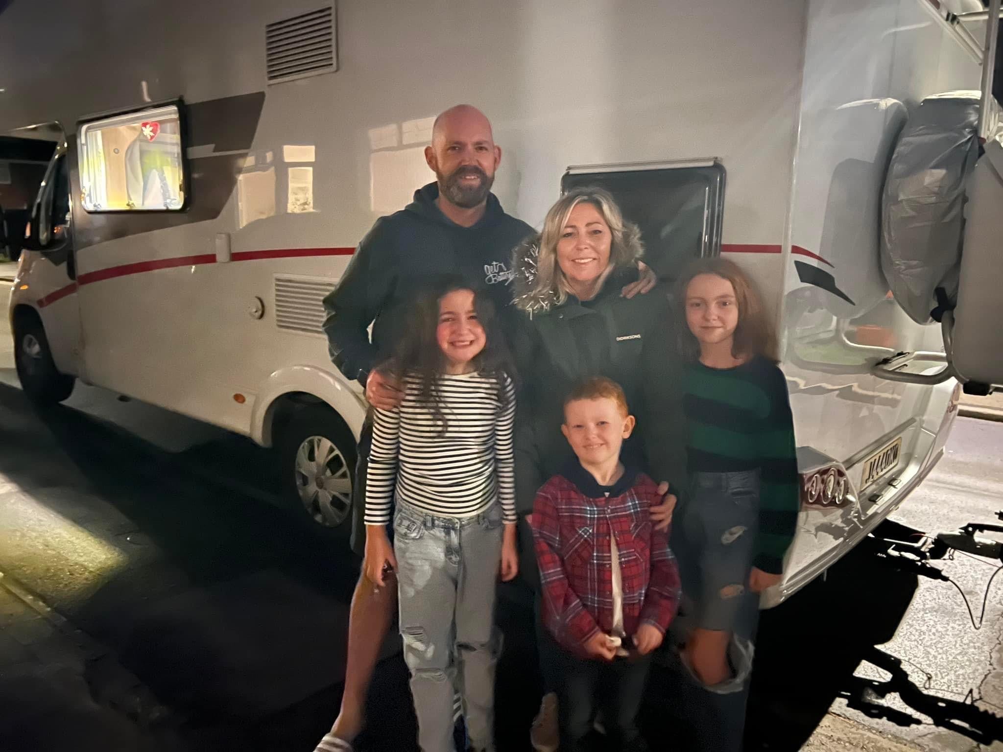 The family with their campervan, November 2022.