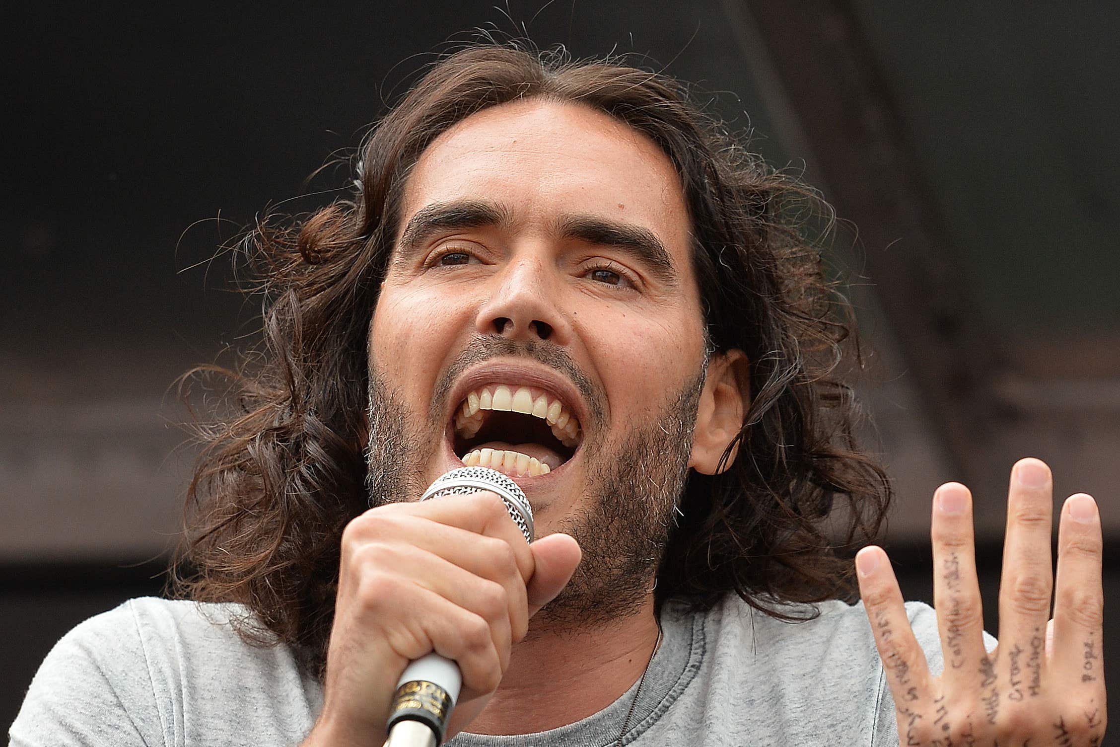 Russell Brand ordered ’disciples’ at his Community Festival not to film him, for fear they’d upload the content to the internet (John Stillwell/PA)
