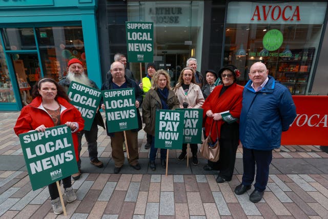 Members of the National Union of Journalists (NUJ) and supporters on a picket line outside the Belfast News Letter office (Liam McBurney/PA)