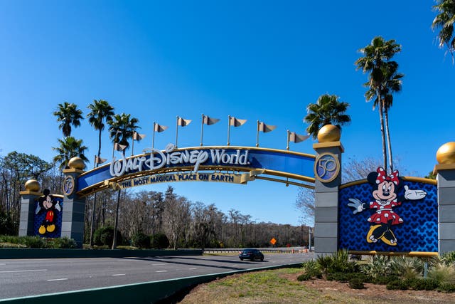 <p>A Walt Disney World entrance arch gate in Orlando, Florida, USA. Walt Disney World is an entertainment resort complex.</p>