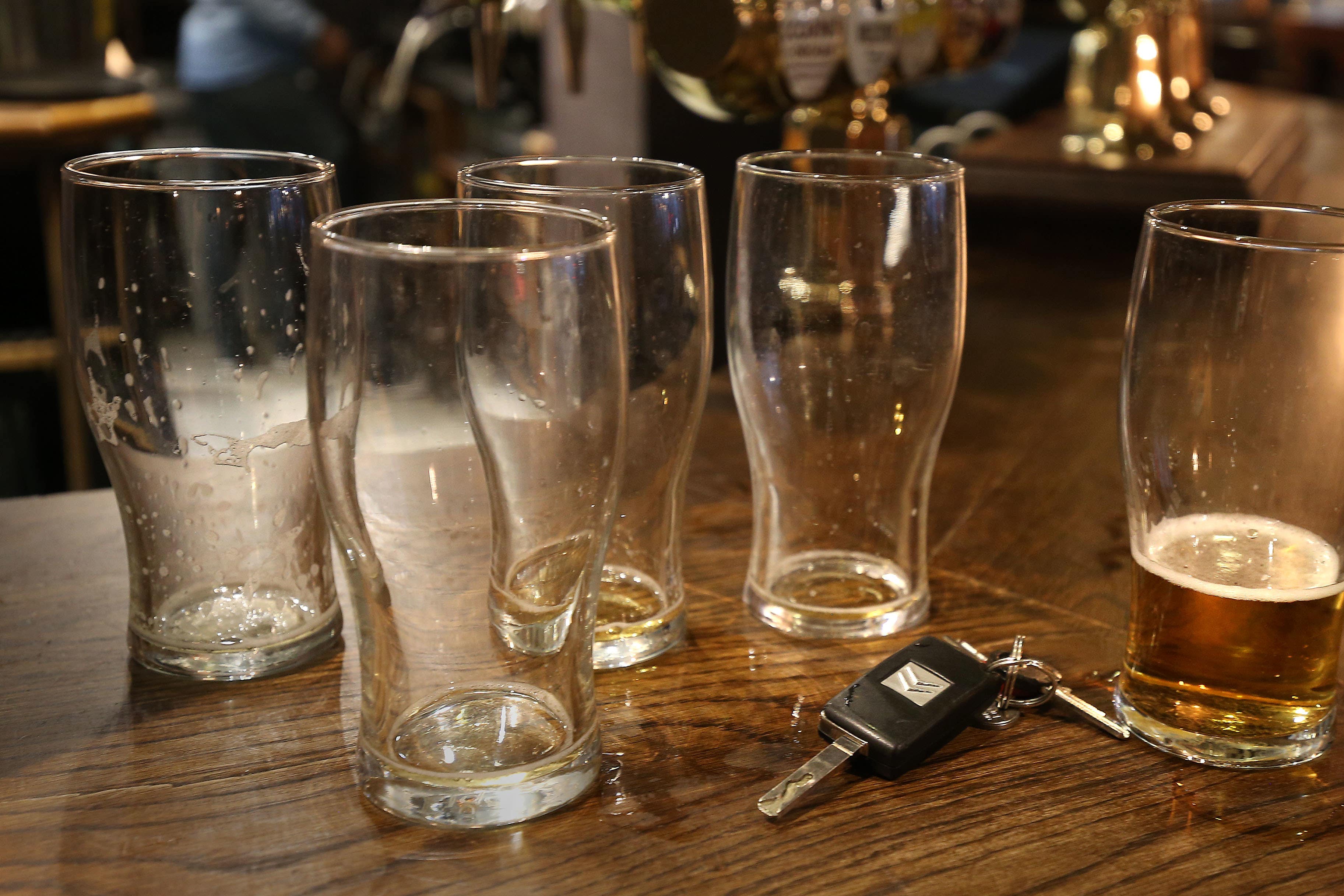 Beer glasses in a pub in London (Philip Toscano/PA)