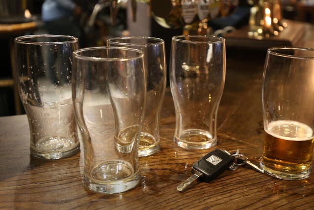 Beer glasses in a pub in London (Philip Toscano/PA)