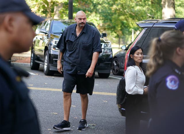 <p>Senator John Fetterman in his typical dress of shorts and a button-up shirt </p>