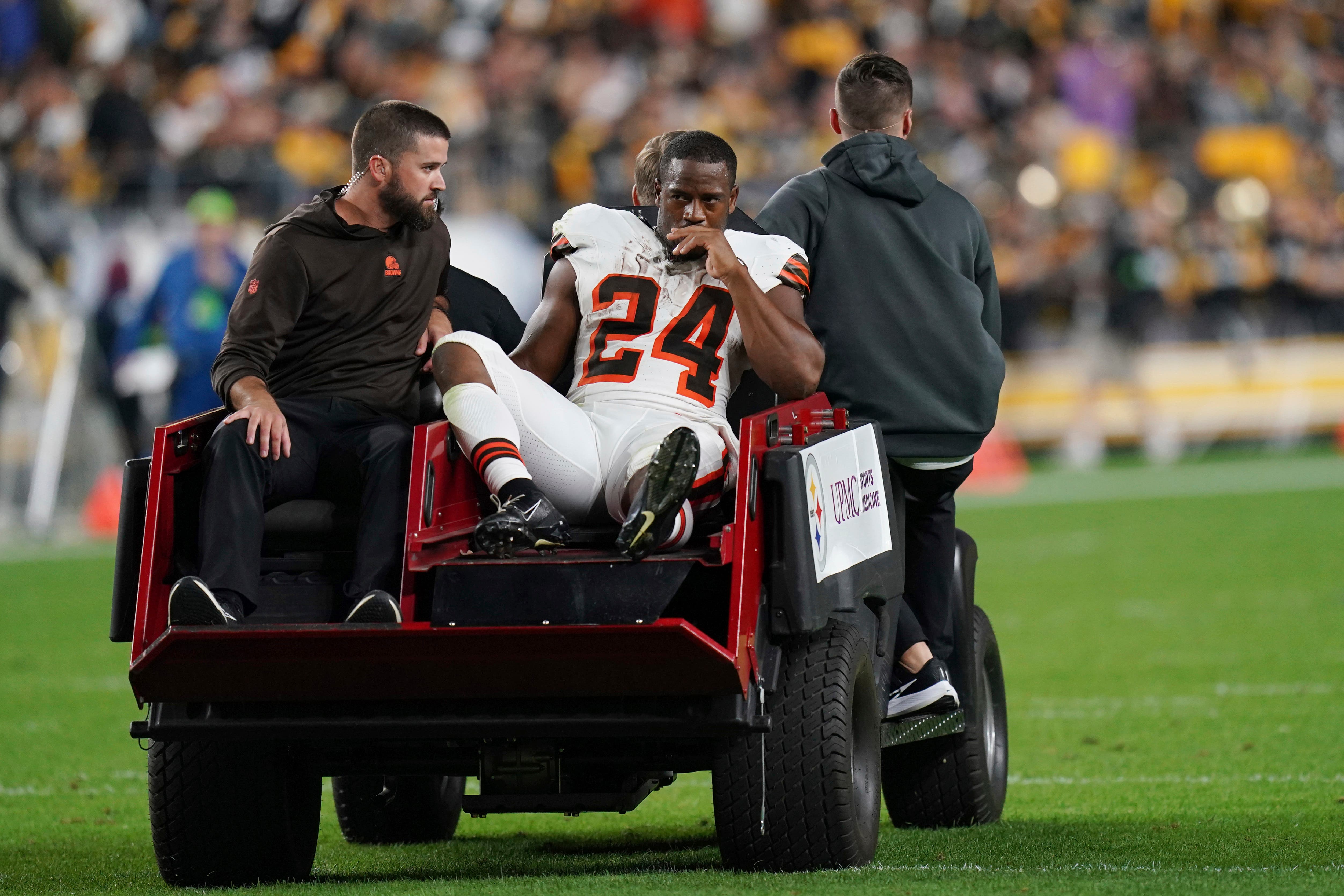 Cleveland Browns running back Nick Chubb is carried off the field with an injury (Matt Freed/AP)