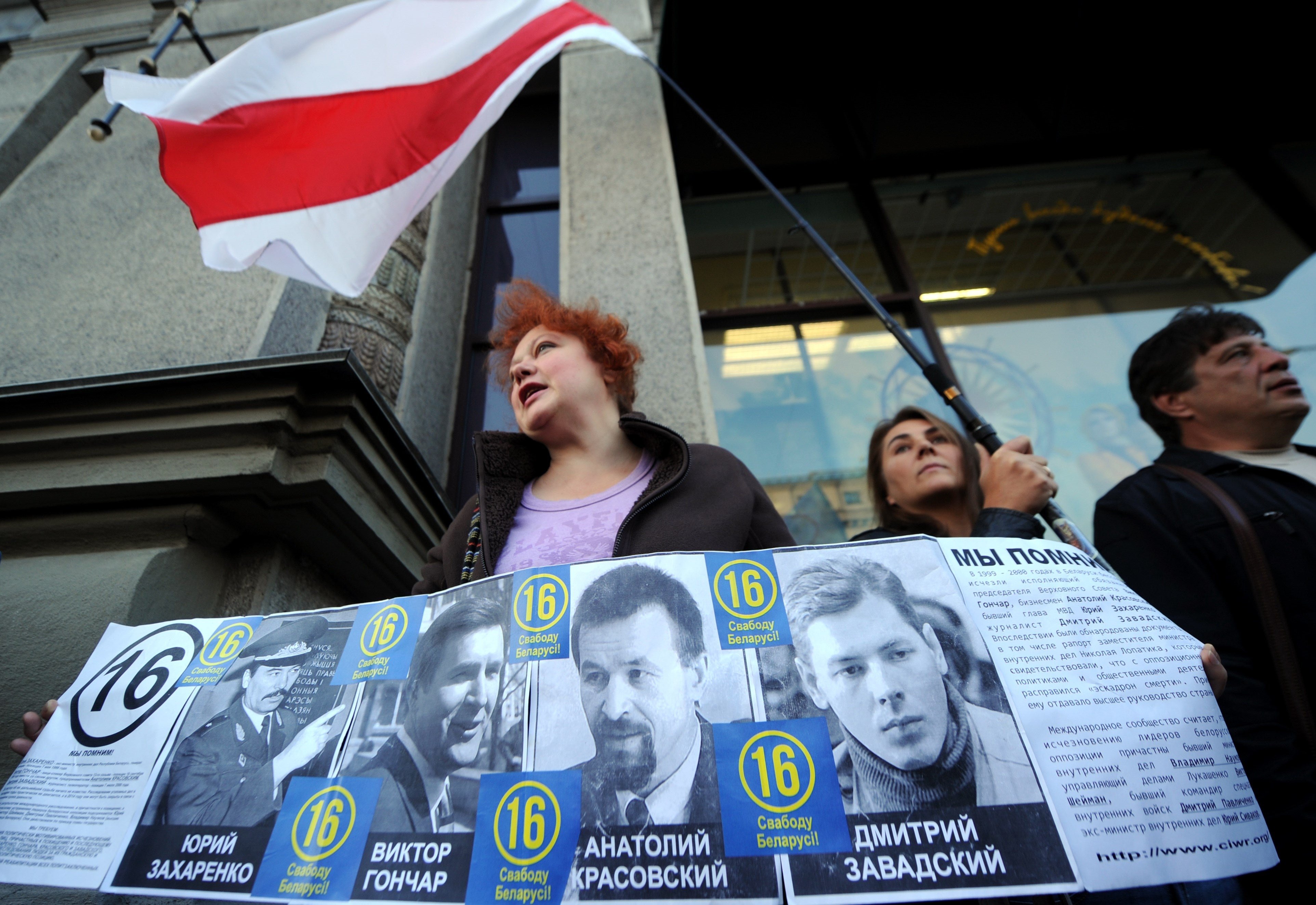 Belarus’ opposition activists hold portraits of missing people during a protest rally in Minsk on 16 September 2015. Four prominent individuals: former interior minister Yury Zakharenko, politician Viktor Gonchar, businessman Anatoly Krasovsky and cameraman Dmitry Zavadsky, all opposed to Belarus president Alexander Lukashenko’s regime have disappeared since 1999