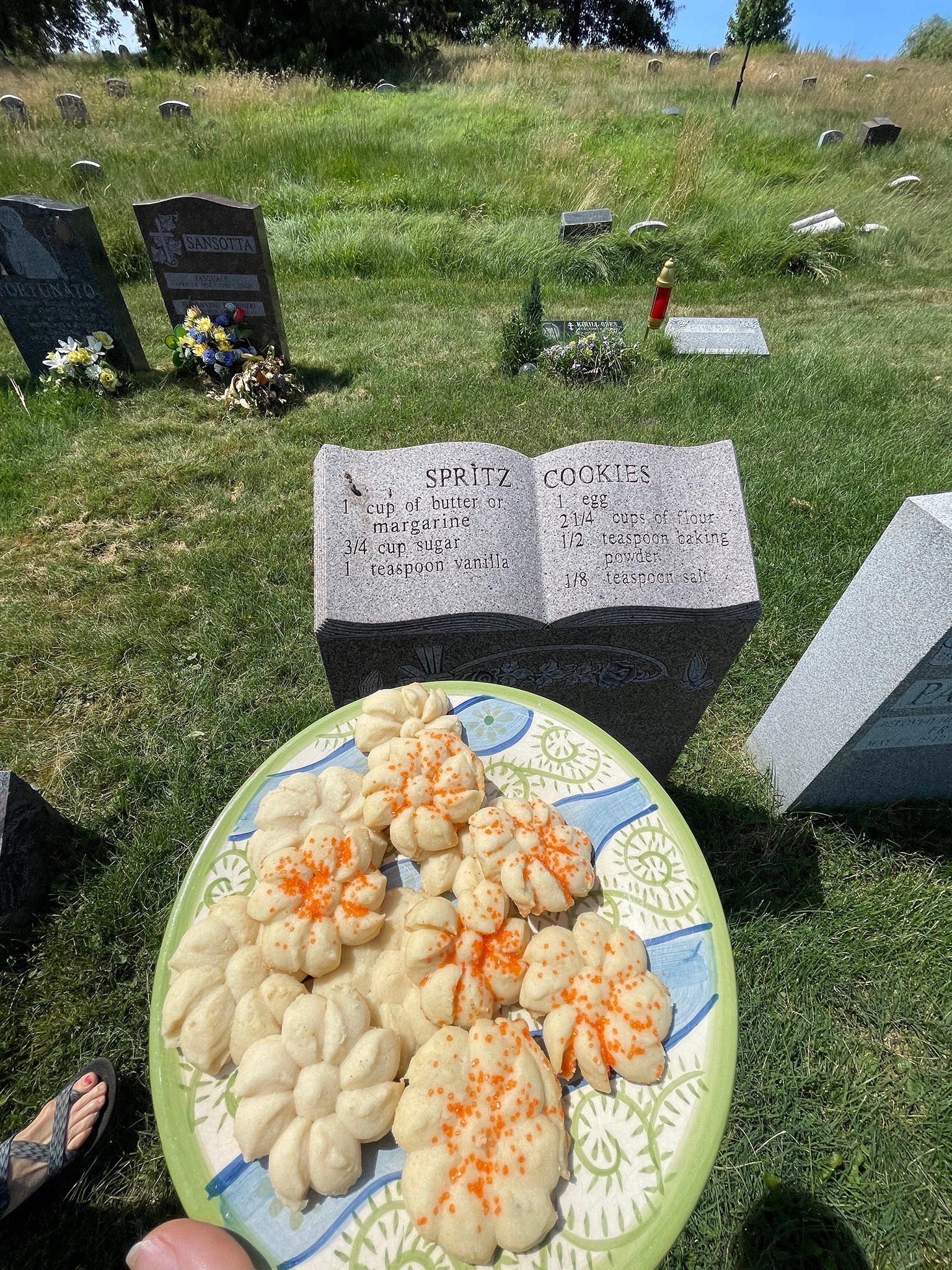 Naomi Odessa Miller-Dawson’s gravestone is shaped like an open cookbook and shares a recipe for spritz cookies