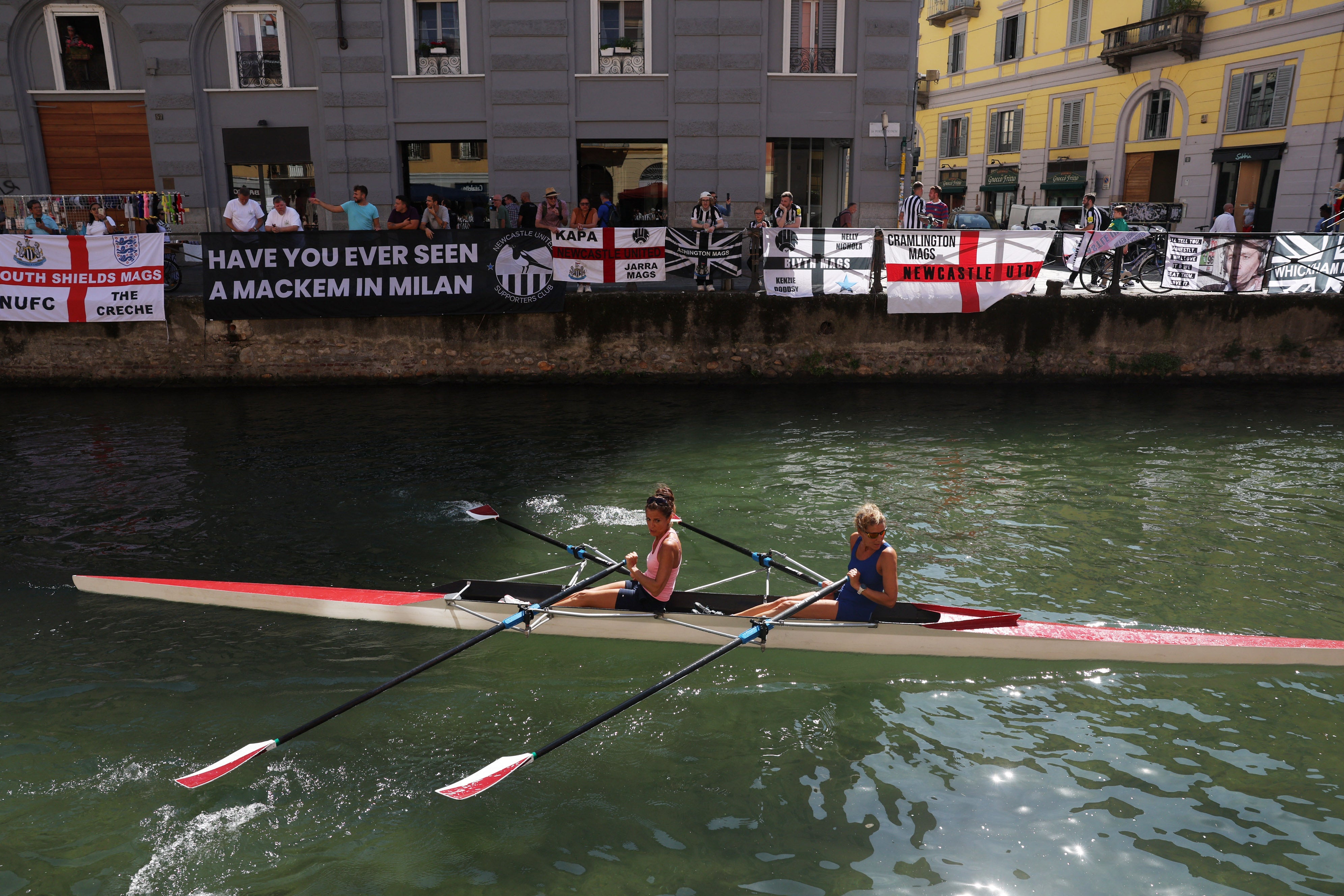 Newcastle flags adorn the canalside in Navigli