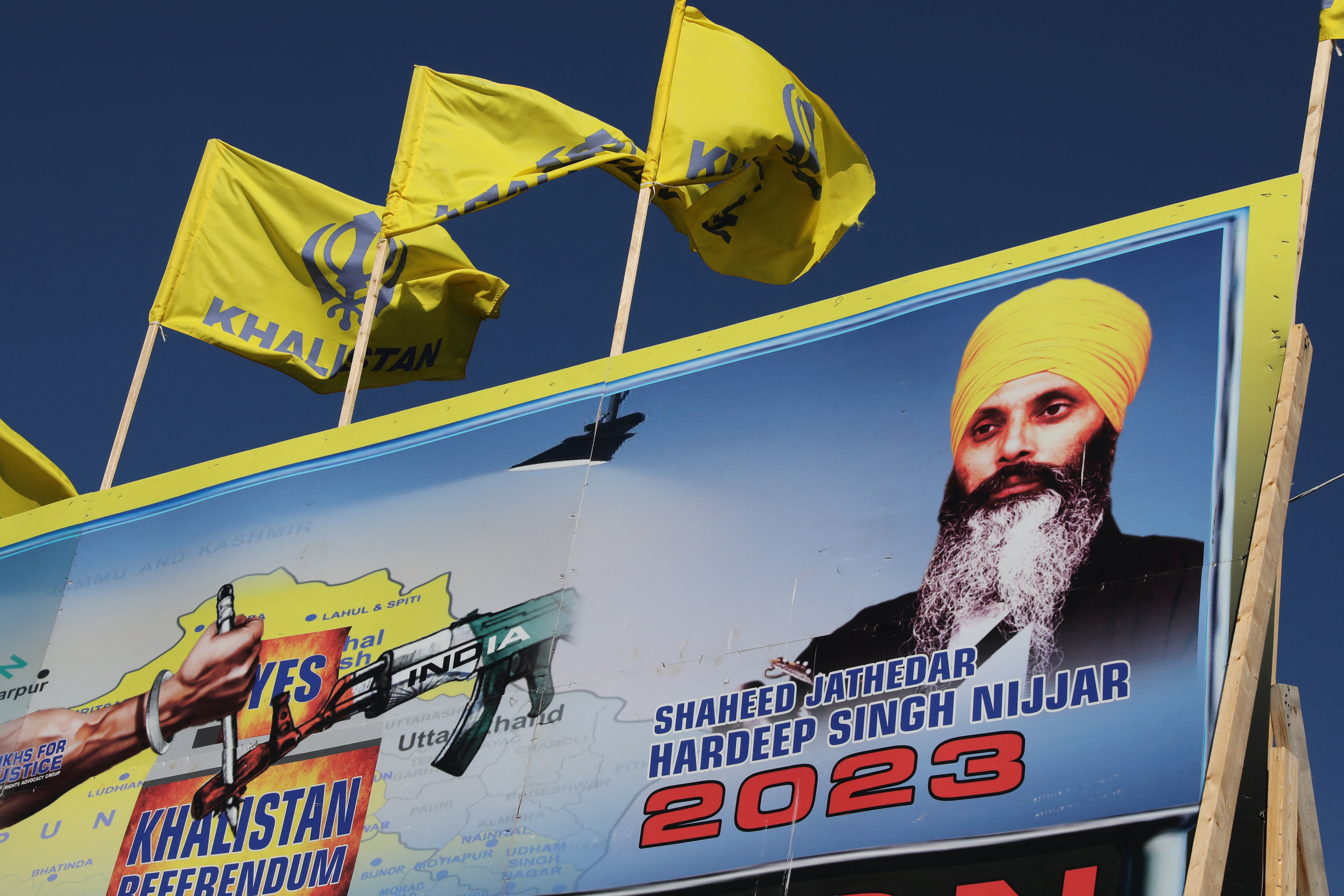 A mural features the image of late Sikh leader Hardeep Singh Nijjar, who was slain on the grounds of the Guru Nanak Sikh Gurdwara temple in June 2023 in Surrey