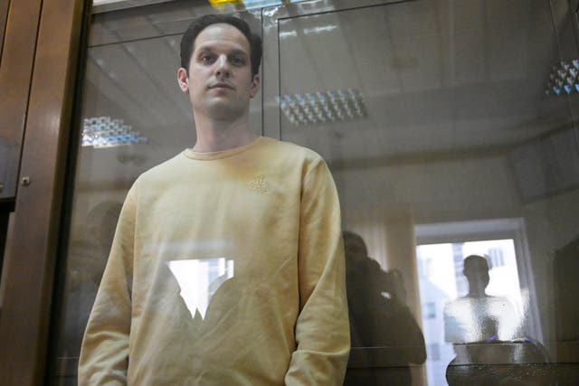 <p><em>Wall Street Journal</em> reporter Evan Gershkovich stands in a glass cage in a courtroom at the Moscow City Court, in Moscow, Russia, on Tuesday, 19 September 2023</p>
