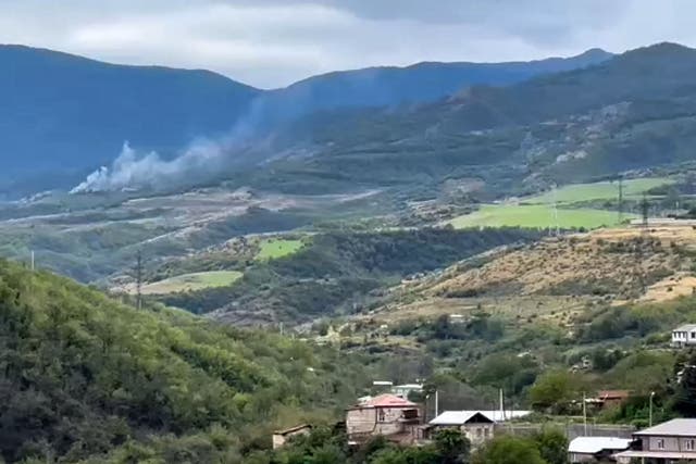 <p>Smoke from an explosion on a hilltop outside Stepanakert, Nagorno-Karabakh</p>