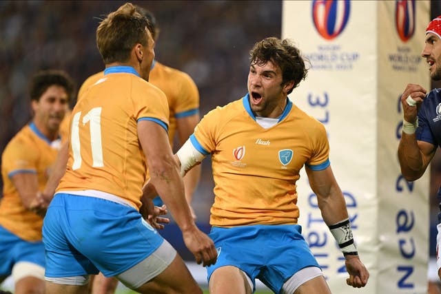 <p>Felipe Etcheverry of Uruguay celebrates during the match against France, though the try would be ruled out </p>