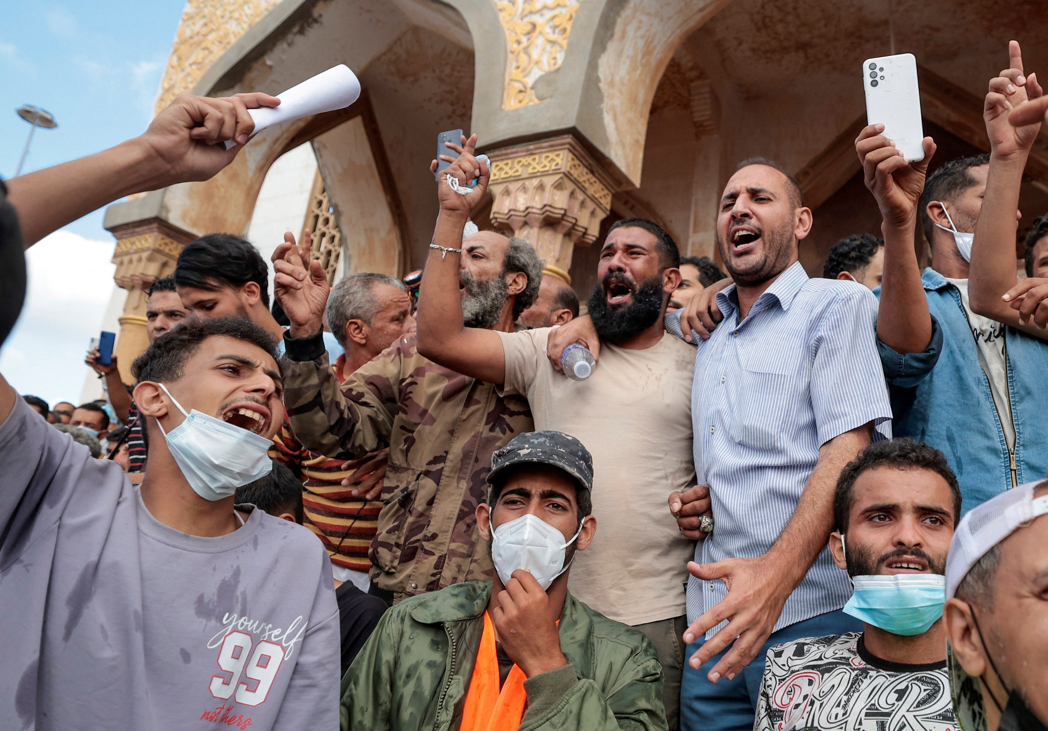 People who survived the deadly storm that hit Libya protest outside the al-Sahaba Mosque in Derna